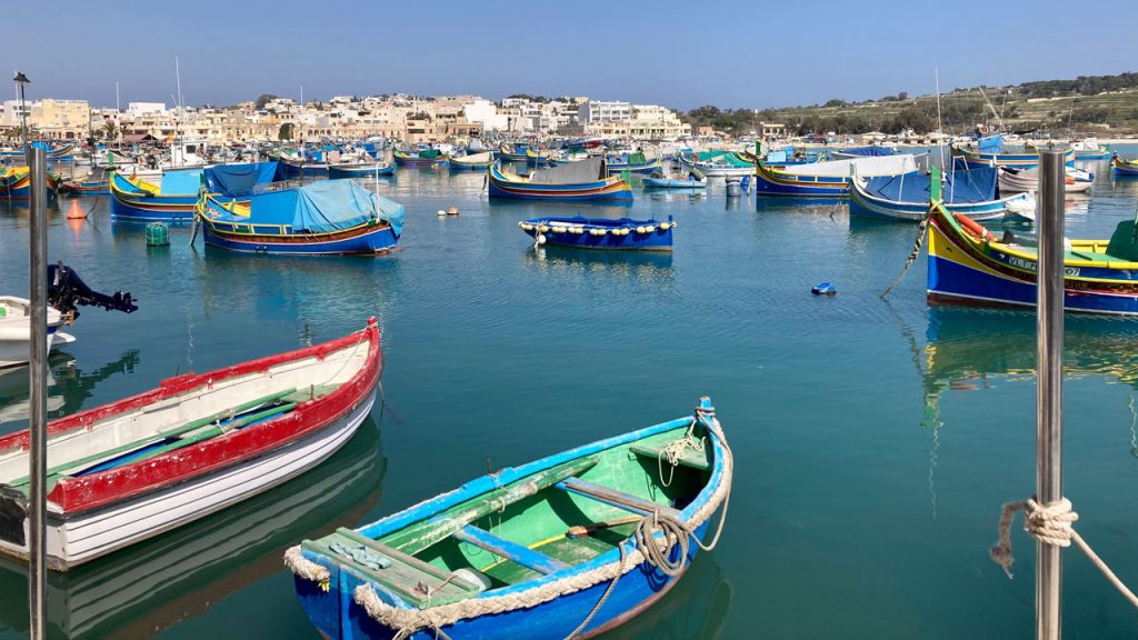 Traditional Maltese boats in the bay at Marsaxlokk.
