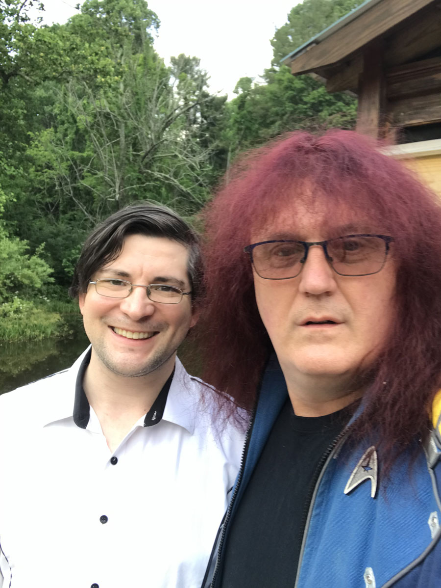 Warren Lapine, wine blogger and book publisher, has long hair and wears flashy shirts; he looks like a rock star. Will May, wine blogger and sommelier, has short hair, wears glasses, and is a dapper dresser. He looks a bit like Clark Kent.